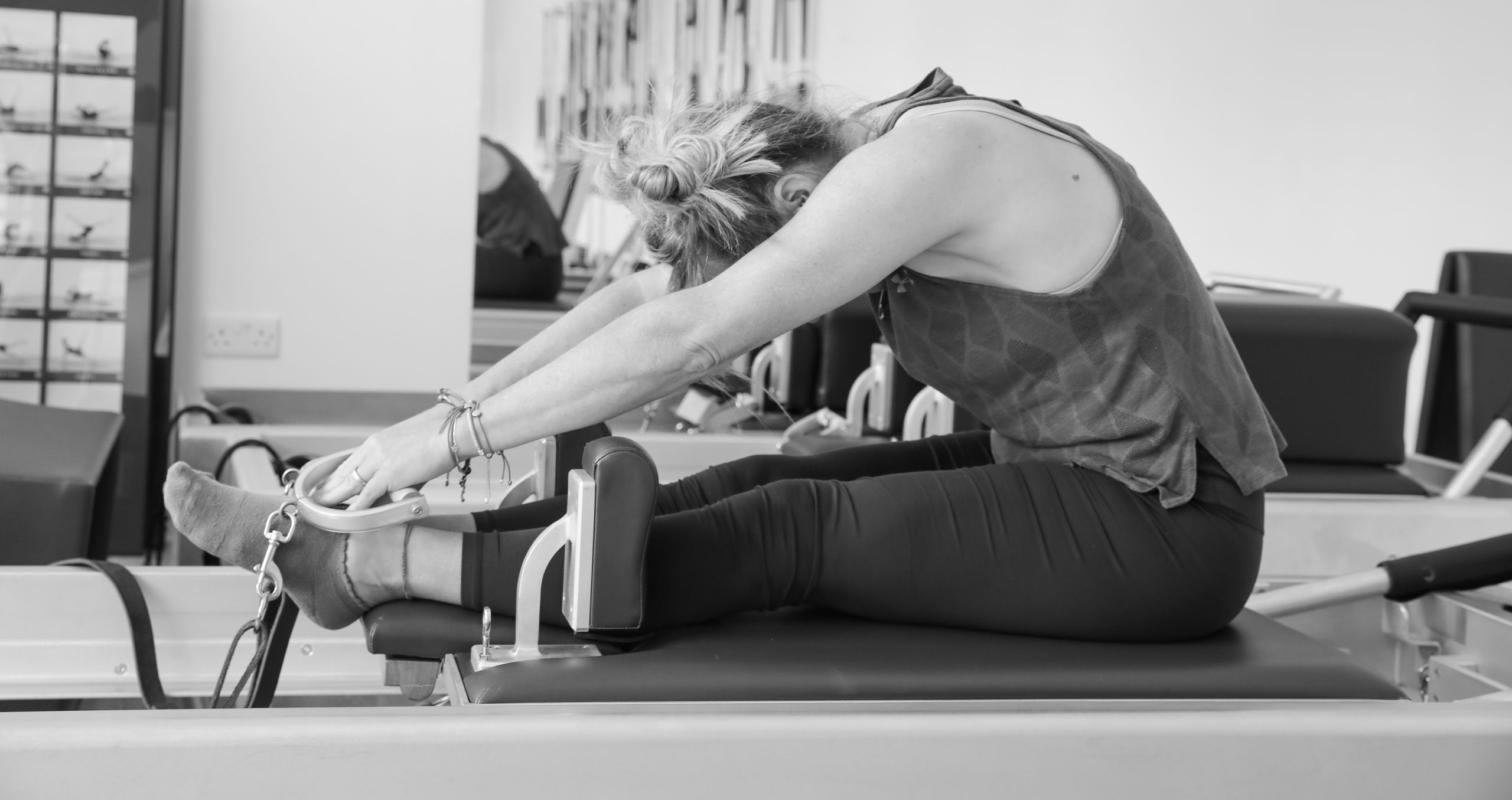 Student performing Mat Pilates exercises for core strength and flexibility at BodyAct Pilates, Cranbrook.